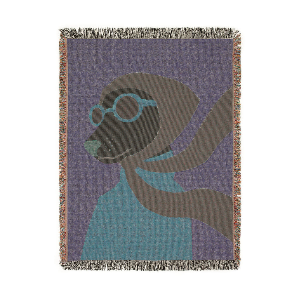Woven blanket with abstract design of a cat on a white background
